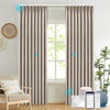 Electric curtains from BRERZE series installed in a living room.
