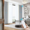 FLEUR smart electric curtains in a modern bedroom, featuring remote-controlled opening and closing, sheer and blackout double-layer design for privacy and light control.
