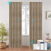 LOOM custom motorized blackout curtains in ripplefold style, shown in warm beige with subtle geometric texture. Smart control via app, remote, and voice assistant integration, ideal for modern smart interiors.

