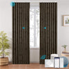 LOOM custom motorized blackout curtains in ripplefold style, shown in warm beige with subtle geometric texture. Smart control via app, remote, and voice assistant integration, ideal for modern smart interiors.

