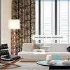 NATURAL smart curtains featuring jungle-inspired leaf patterns, integrated with Google Assistant for hands-free voice control in a modern neutral-toned living space.