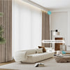 NESTO collection custom motorized blackout curtains in ripplefold style, shown in modern bedroom with smart remote control in hand

