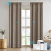 NESTO collection motorized blackout curtains in ripplefold style, installed in modern room with smart home control system and voice assistant compatibility.