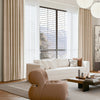 Electric curtains from NUBRA series installed in a living room.