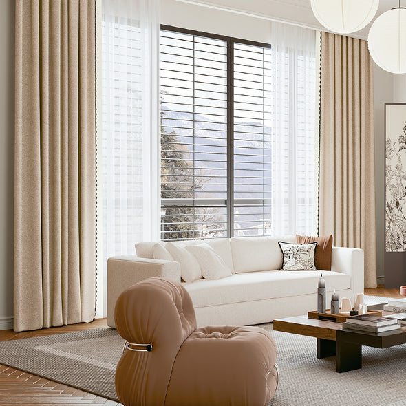 Electric curtains from NUBRA series installed in a living room.