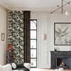 VERDANA electric curtains with botanical print and blackout layer installed in a French-style living room, blending harmoniously with marble fireplace and art decor for an elegant home ambiance.